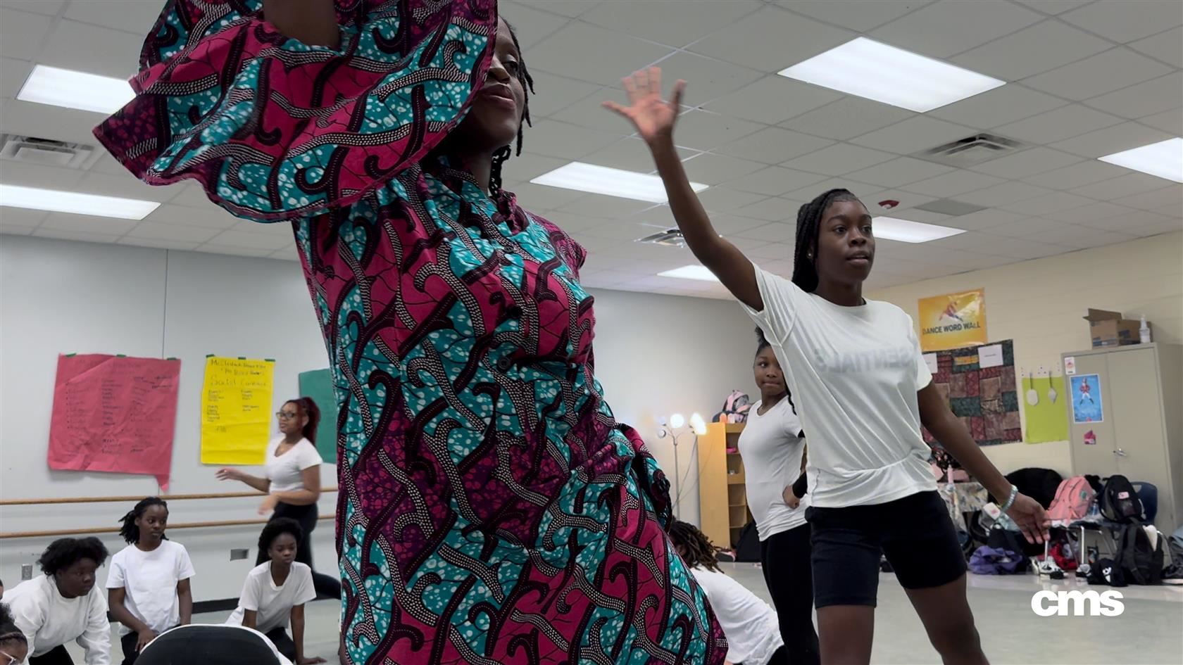   Elsie Mufuka, dance teacher at McClintock Middle School, guides her honors dance class 